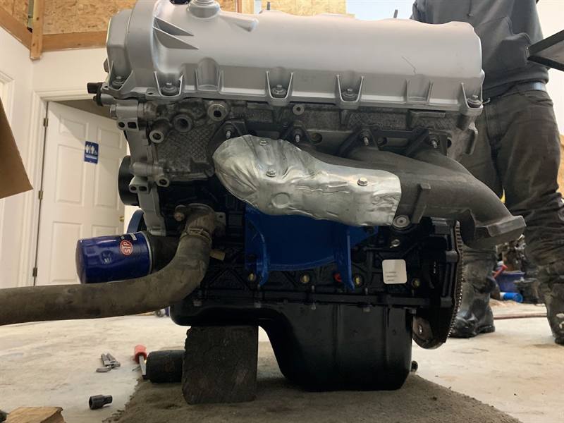 An engine out on the shop floor during a repair